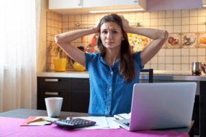 Woman Stressed In Kitchen